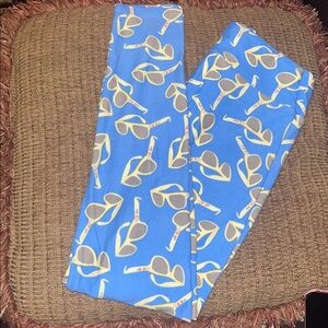 LulaRoe One Size leggings, NEW, Blue background with lt yellow sunglasses